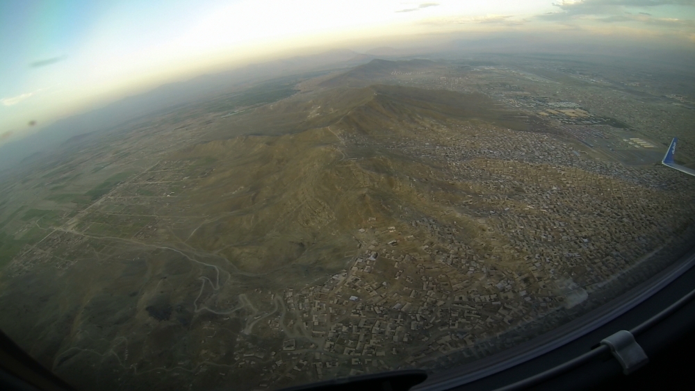 Departing from Kabul with a right turn out. The airport is just above the winglet. Bagram is on the other side of the aircraft. Lots of mountains here and challenging terrain.